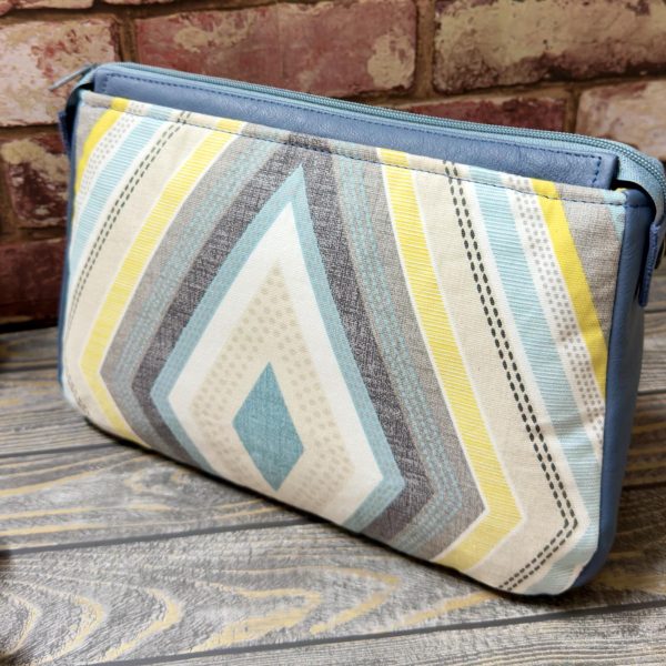 Geometric Pattern Ladies Cosmetic Bag with Leather accents.