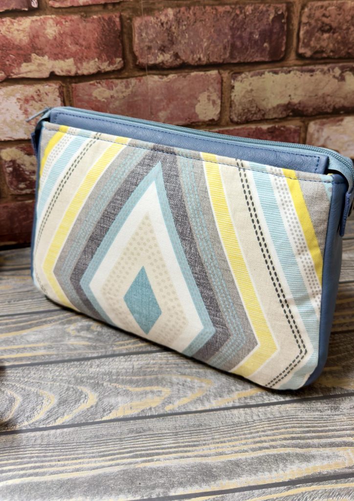 Geometric Pattern Ladies Cosmetic Bag with Leather accents.